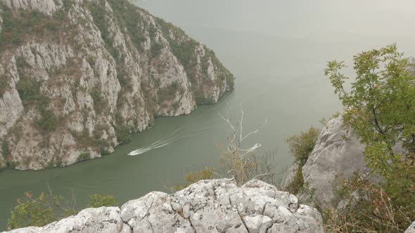 Boats passing on state border between  Serbia and Romania 4K 2160p 30fps UltraHD footage - Narrowest