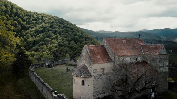 Aerial view from drone flying above a fortified castle in Romania
