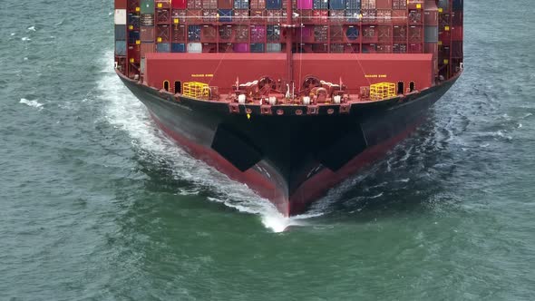 Container Ship Bow in the Ocean Aerial View