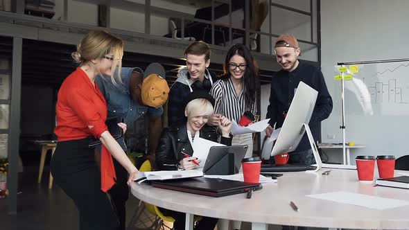 Team of Multi Ethnic of Young Hipster People Discussing Business Ideas