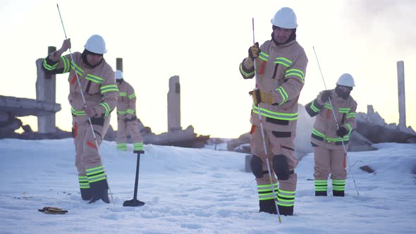 Rescuers are Searching for Victims of the Disaster After an Avalanche in the Runes