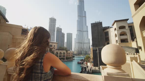 Tourist Looking at Urban City Center of Dubai with Burj Khalifa Skyscraper