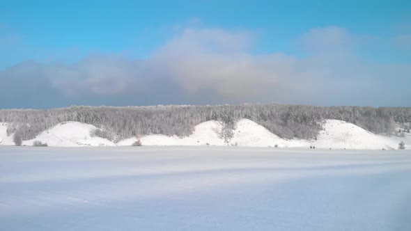 Panorama of a hill on a winter day