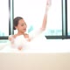 Young asian woman relax in bathtub - VideoHive Item for Sale