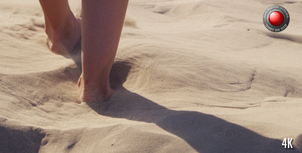 Feet in the Desert Sand