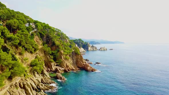 4K Drone Shot Of Tropical Coast Cliffs In Costa Brava, Blanes
