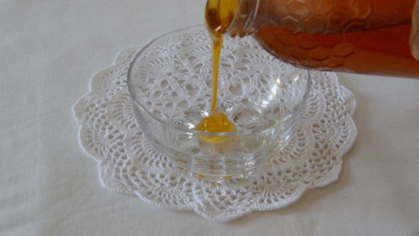 Honey Poured Inside a Bowl