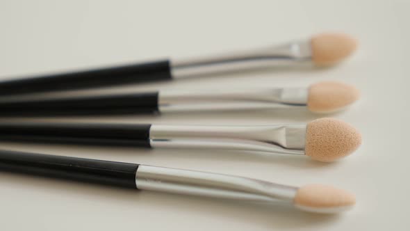 Panning over eyeshadow makeup  brush set 4K 2160p 30fps UltraHD video - Collection of  beauty treatm