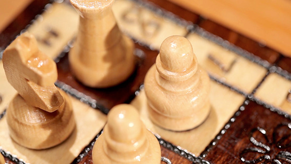 Close Up Chess Pieces On A Board