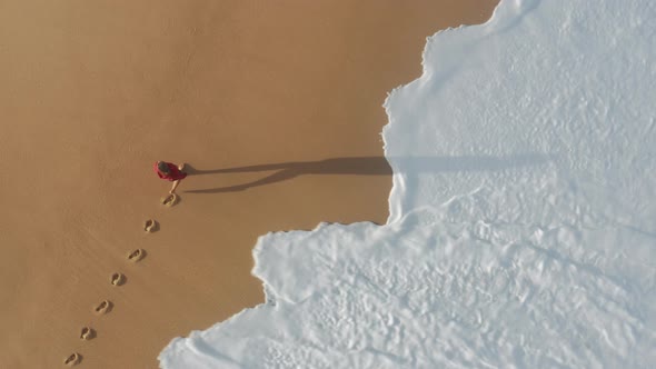 Drone Footage of Caucasian Male Tourist Hiking Within the Seascape Area