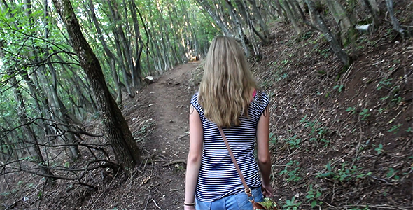 Girl Walking Alone Through the Forest 3