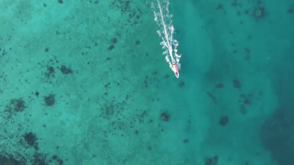 Vertical Video Boats in the Ocean Near the Coast of Zanzibar Tanzania Aerial View