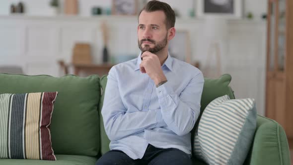 Worried Young Man Thinking About Problems 