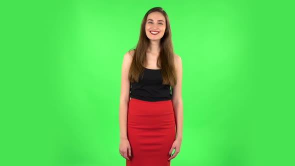 Cheery Female Bursting with Laughter Being in Positive Over Green Screen