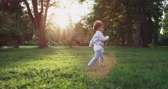 Beautiful Charismatic Boy in the Suit Running