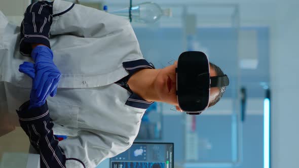 Vertical Video Laboratory Doctor Experiencing Virtual Reality Using Vr Goggles