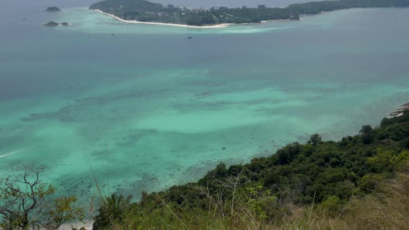 Ultra slow motion shot tilting up of Koh Lipe Island in Thailand from viewpoint