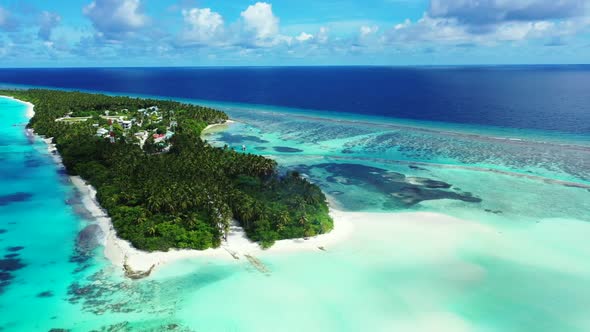 Aerial drone seascape of marine bay beach vacation by blue lagoon and white sand background of a day