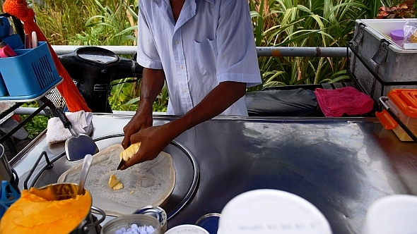 Cooking Pancake with Pineapple on the Street