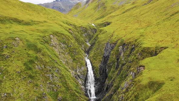 Aerial view of a waterfall in Anderson Bay, Unalaska, Alaska, United States.