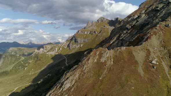 Aerial Flying towards Mountain Peak in the Italian Dolomites during Sunset