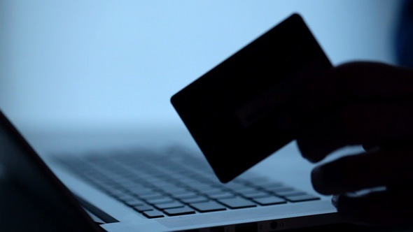 Using Credit Card On-Line. Silhouette.