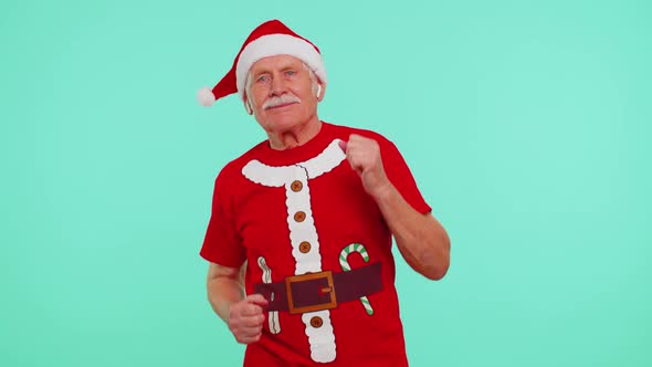 Senior Christmas Grandfather Listening Music Via Earphones Dancing Disco Fooling Around Having Fun