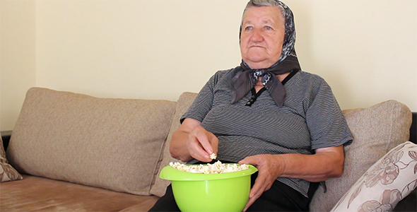 Grandmother Eating Popcorn from the Bowl