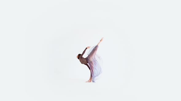 Young Woman Doing Modern Dance On A White Background 3