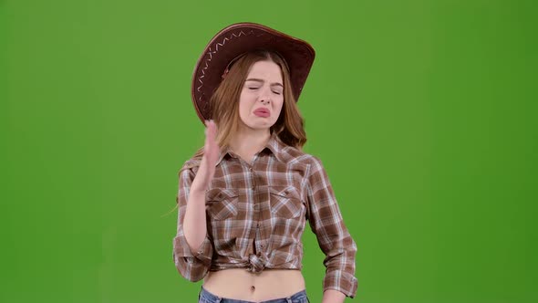 Cowboy Style Girl Closes Her Nose, Smells Unpleasant Around Her. Green Screen