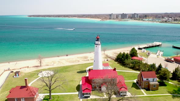 Fort Gratiot Lighthouse in Port Huron, Michigan with drone videoing forward.