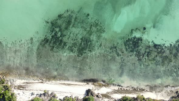 Zanzibar Tanzania  Aerial View of the Ocean Near the Shore of the Island Slow Motion