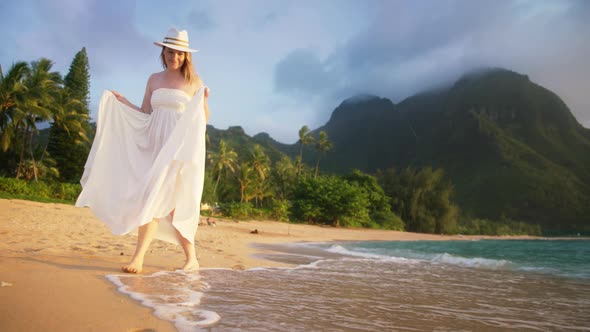 Happy Woman Enjoying Relaxing Sunset Beach Walk Lady Looking at Golden Sunlight