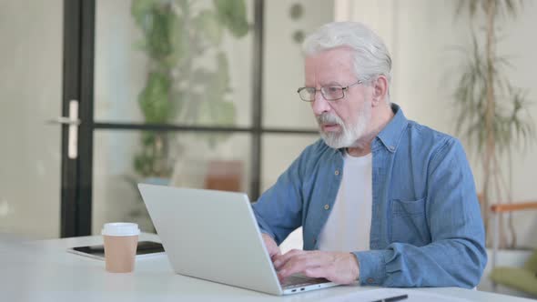 Senior Old Man Having Loss While Using Laptop Failure