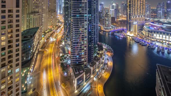 Night Illumination of Dubai Marina Aerial Timelapse UAE