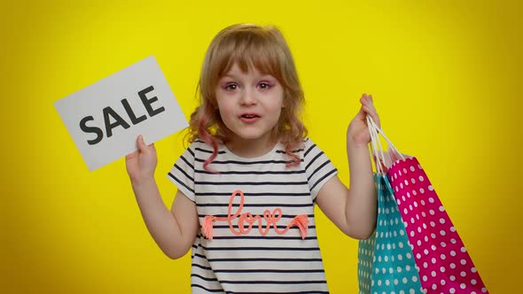 Kid Child Girl Showing Sale Inscription Banner Text Advertising Discounts Shopping on Black Friday