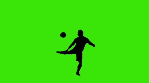 Footballer Juggling The Ball