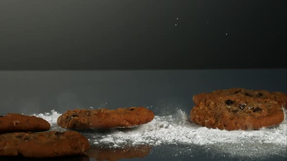 Cookies falling and bouncing in ultra slow motion 1500fps - reflective surface - COOKIES PHANTOM 065