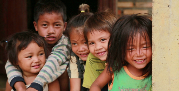 Poor Kids Smiling And Shying alt