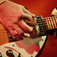 Guitar Player on Stage With Banjo in Background - VideoHive Item for Sale