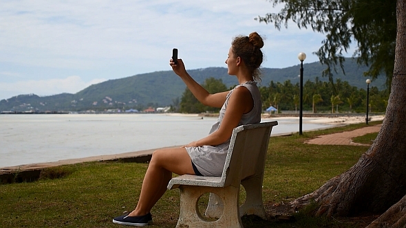 Girl Taking Photo with Smart Phone