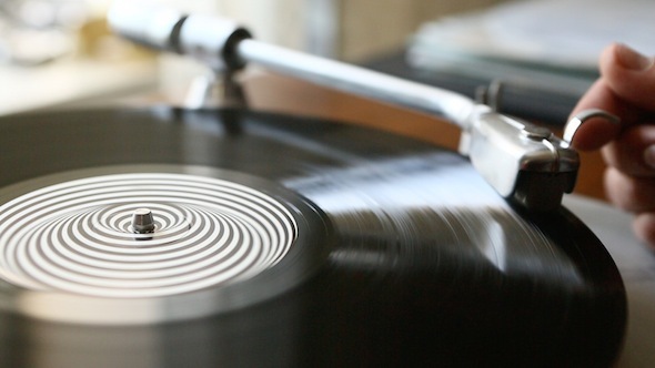 Playing A Record On Vintage Vinyl Turntable