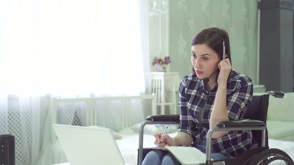 Portrait Young Woman Disabled Wheelchair Remote Work at Home Computer Headset