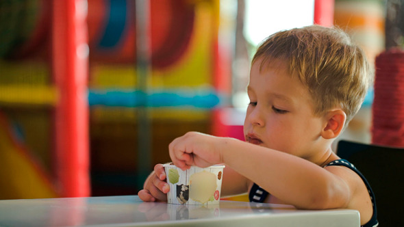 Little Boy Eating Chocolate Ice Cream
