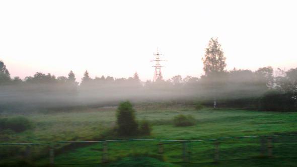 Passing By Countryside In A Fog