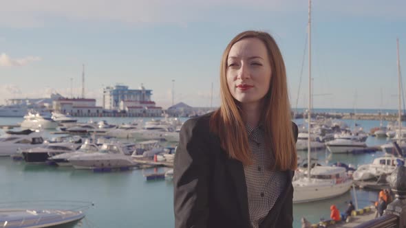 Charming Woman Posing in Port Alone.