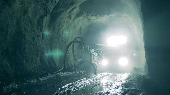 Underground Mine with a Functioning Industrial Hose