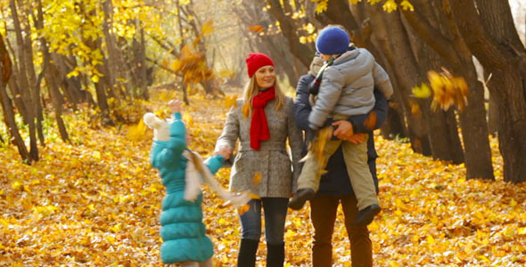 Family Walking in Park alt