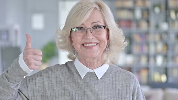 Portrait of Gorgeous Old Woman Showing Thumbs Up