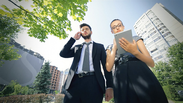 Couple Standing Together Work On The Tablet